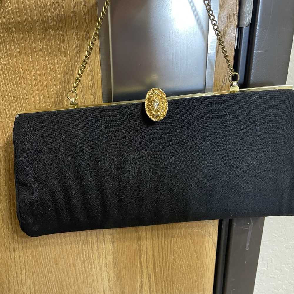 Elegant Black Clutch with Gold Accents